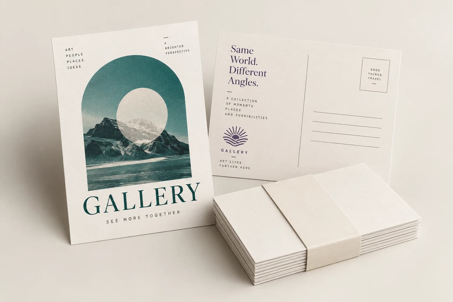 Gallery postcard set: the front card and reverse card standing upright, with a paper-banded stack of blank postcards in front of them.