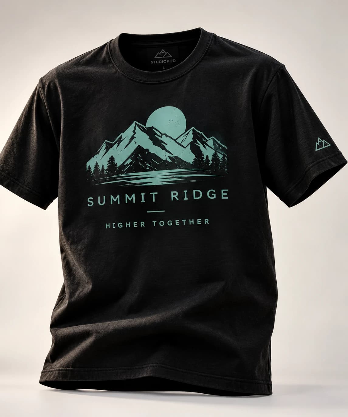 Finished black Summit Ridge trail shirt with the teal mountain artwork printed and visible.